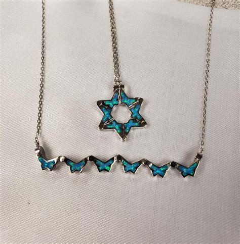 Star of david butterfly necklace - Butterfly Star of David Necklace - Jewish Star Necklace - Sterling Silver - Magnetic Star of David - CZ Bat Mitzvah Necklace Israel (3.1k) $ 75.00. Add to cart. Loading ... Blue Opal Star of David Butterfly Necklace, Opal Jewish Star Necklace, Pull Apart Butterfly necklace (220) $ 34.95. FREE shipping Add to cart ...